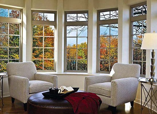 Living Room With White Framed Casement Windows