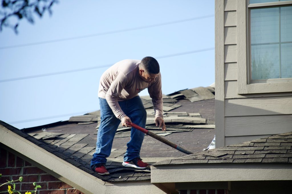 roofing crew replacing a roof