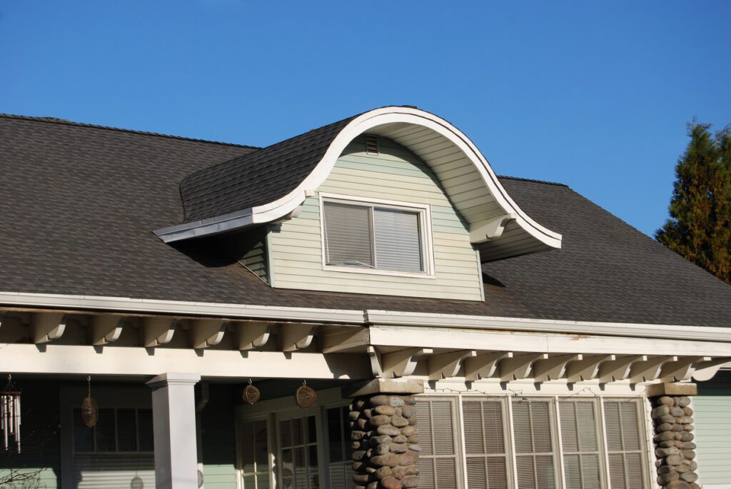 1900's craftsman bungalow with a nice example of an eyebrow dormer.