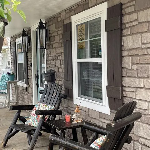 Tando stone siding installed on a porch by a Long Island masonry contractor.