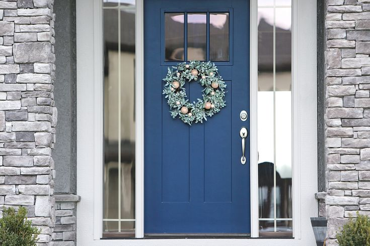 navy blue colored entry door