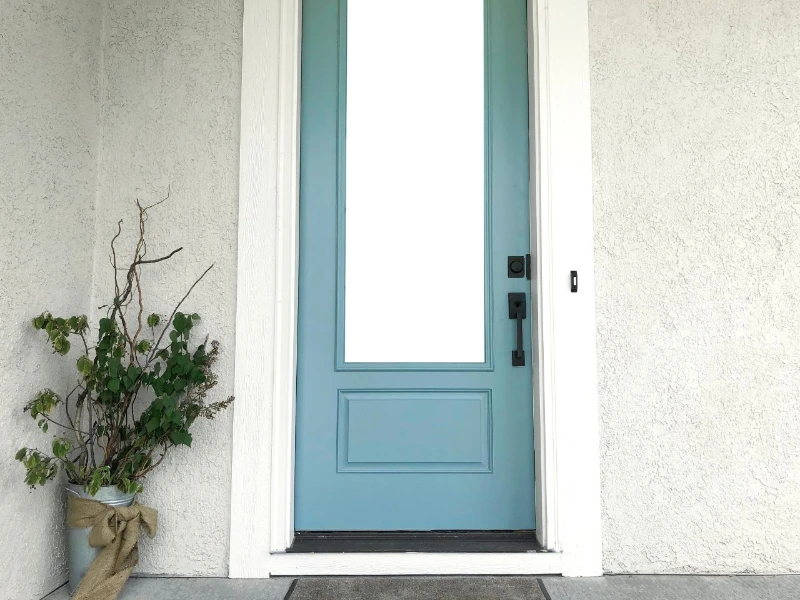 Sky Blue Entry Door with a large glass panel in a wide white frame 