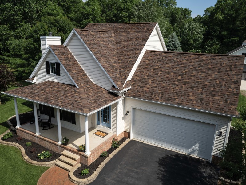 Owens Corning - Unified Home Remodeling Owens Corning Summer Harvest Shingles on a white Long Island home
