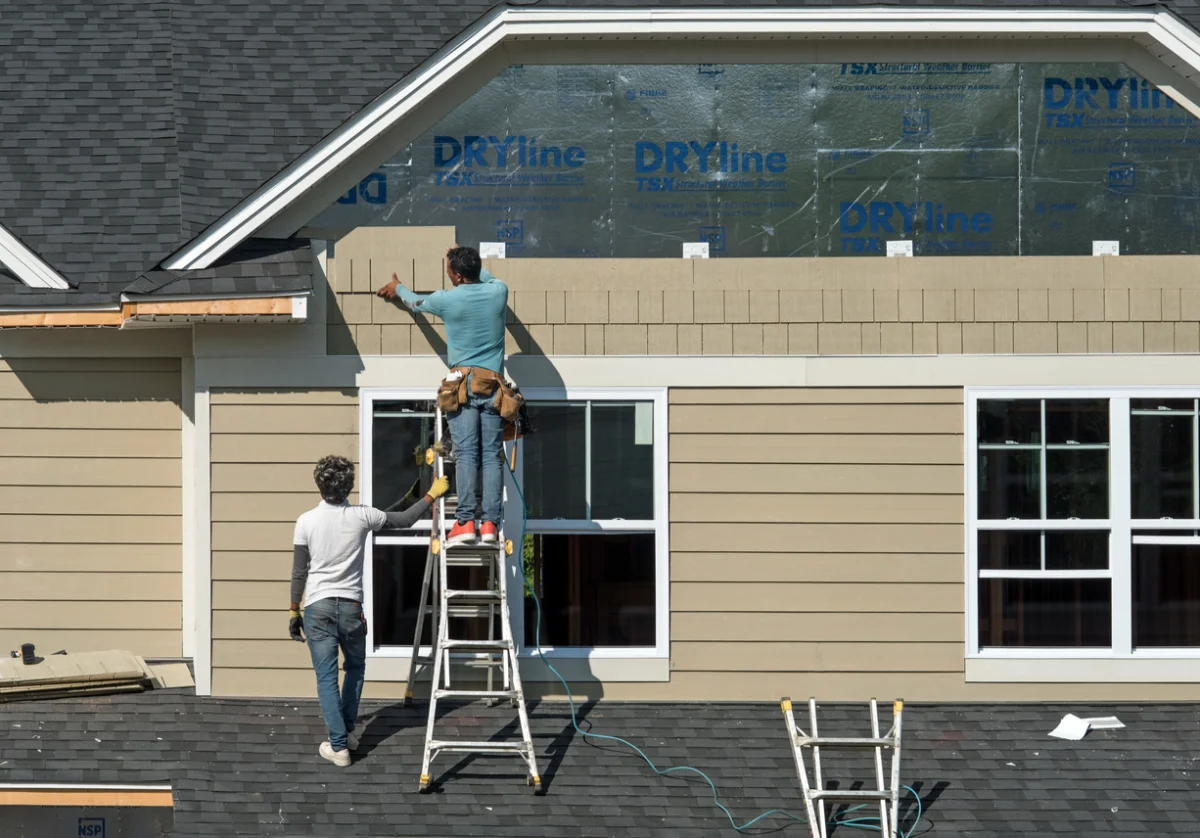 Expert Home Remodeling in Baldwin, NY - Unified Home Remodeling Installing New Siding on a Long Island Home