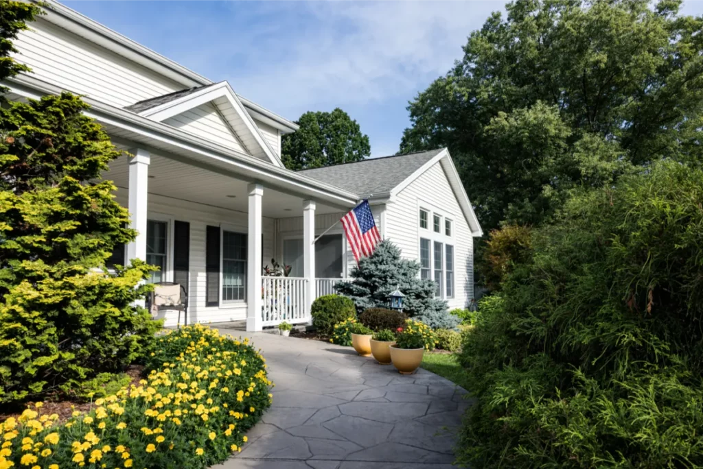 Expert Home Remodeling in Baldwin, NY - Unified Home Remodeling Long Island home with a stamped paver walkway showing a real-life example of paver walkway cost